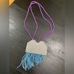 Crossbody phone pouch with tassels by Five Below